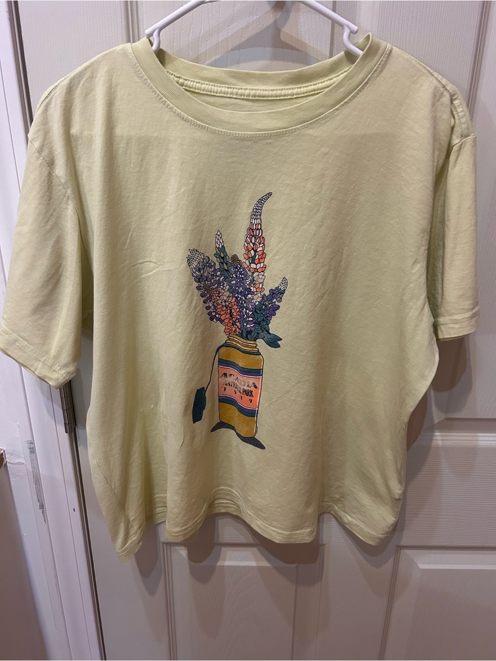 Women's Short Sleeve Graphic Tee in Pale Yellow - Floral Vase Design